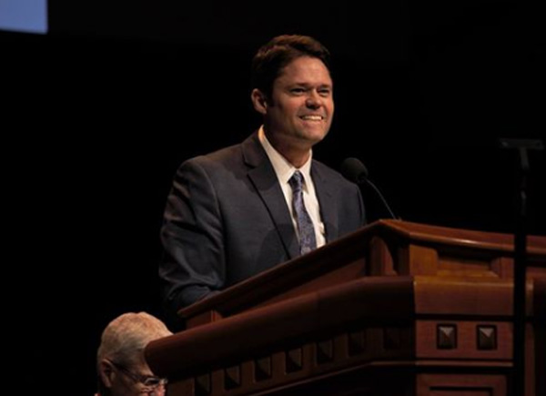 Justin Osmond giving a speech.